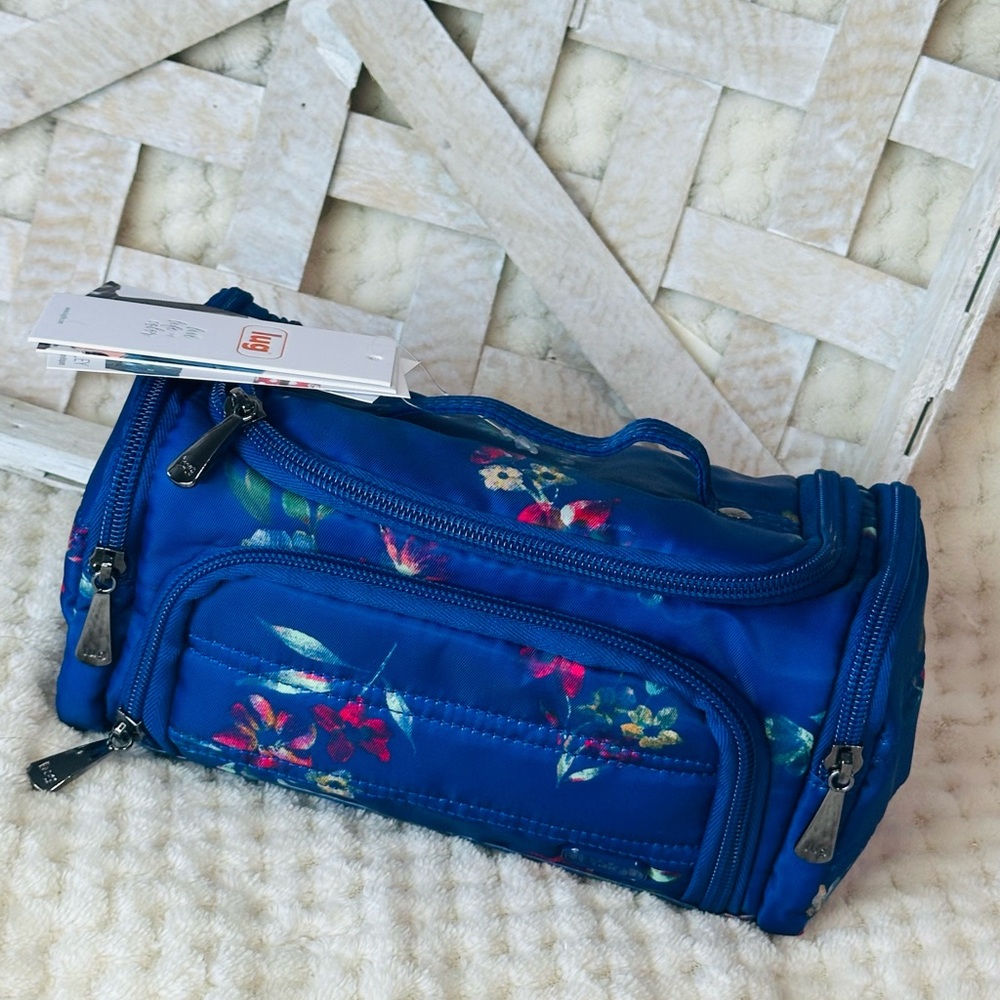 New with tags! Lug Floral bouquet Blue Cosmetic Case mini trolley